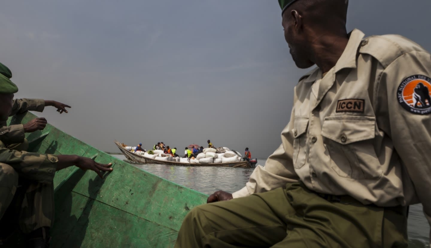 Rangers witnessing some illegal fishing activities in the Lake Sector of the Park