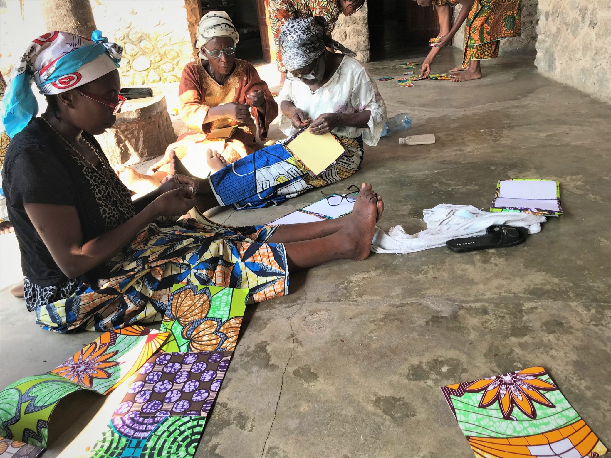 Mustora Widow's Workshop ladies making their products